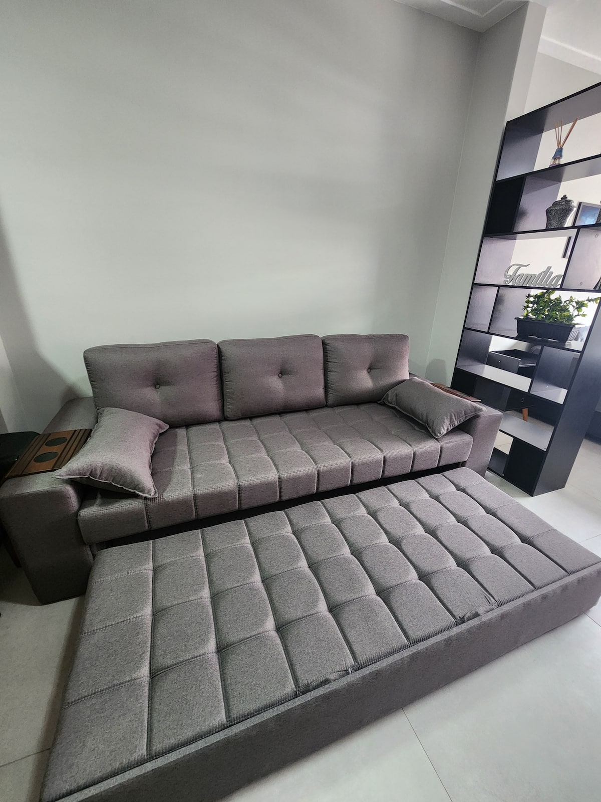 Sala de estar com sofá-cama